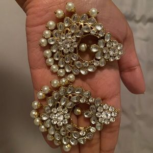 Oversized earrings with fake diamonds and pearls